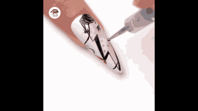 a person is applying nail polish to a nail with a drawing on it .