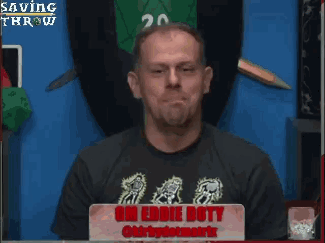 a man behind a sign that says on eddie doty
