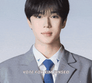 a man in a suit and tie with the words vote for kim junseo above him