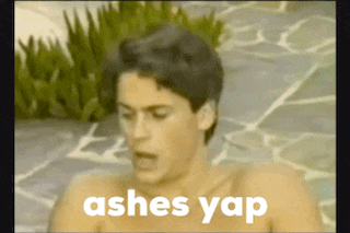 a shirtless man is laying in a hot tub with the words ashes yap written on the bottom