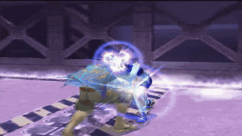 a man in a blue shirt is being hit by a sword