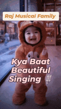 a baby in a teddy bear costume with the words raj musical family written above it