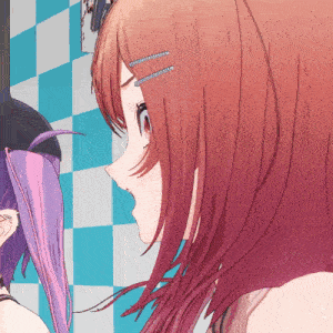 a girl with red hair is looking at another girl
