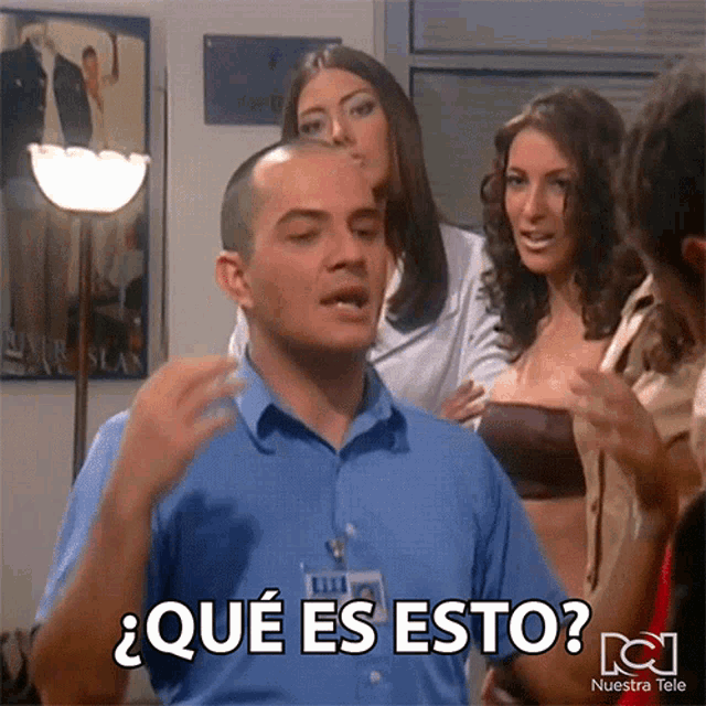a man with a name tag that says " nuestra tele " on it