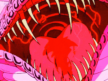 a close up of a monster 's mouth with sharp teeth and a red heart
