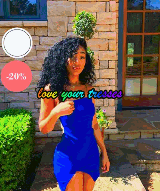 a woman in a blue dress stands in front of a brick building with the words love your dresses written above her