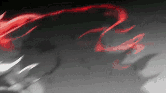 a close up of a person 's face with a red light coming out of it