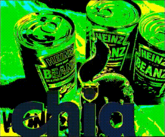 three cans of heinz beans sit on a table