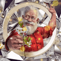 a man with a beard is holding a bouquet of flowers in front of a mirror .