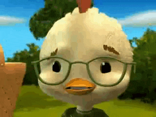 a close up of a chicken wearing glasses in a field