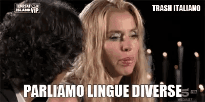 a man and woman are sitting next to each other and the woman is saying " parliamo lingue diverse "
