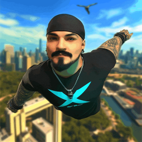 a man in a black shirt with a blue x on it