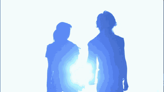 a silhouette of a man and woman holding hands against a white background