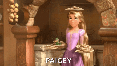 rapunzel from tangled is holding a tray of cookies