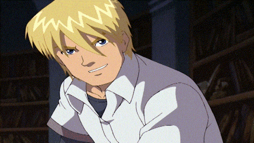 a boy with blonde hair and blue eyes is smiling in front of a bookshelf