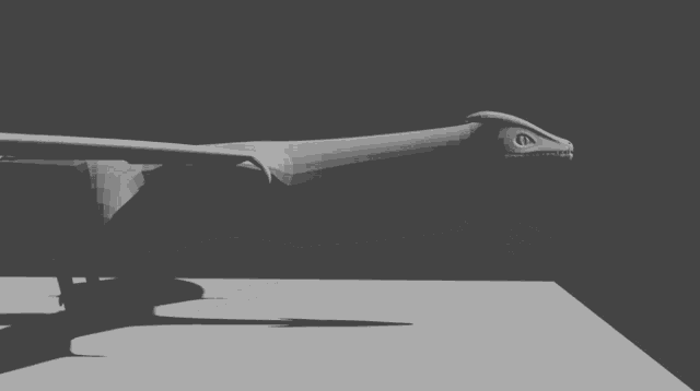 a 3d model of a dragon laying on a table with its wings outstretched .