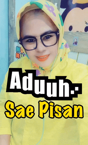 a woman wearing glasses and a yellow shirt with the words aduh- sae pisan on the bottom
