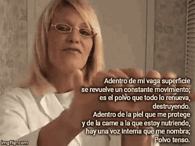 a woman wearing glasses is holding something in her hand with a caption that says adentro de mi vaga superficie