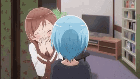 two anime girls are laughing in a living room with a television in the background