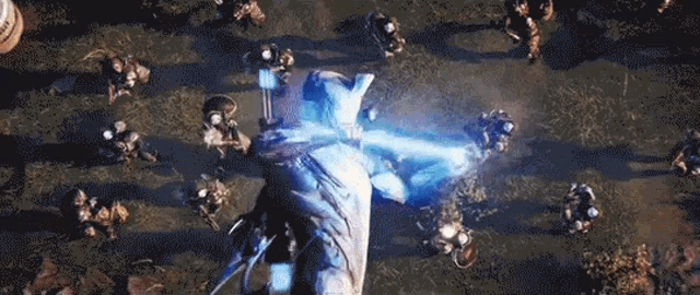a person is flying through the air with a sword in their hand in front of a crowd .