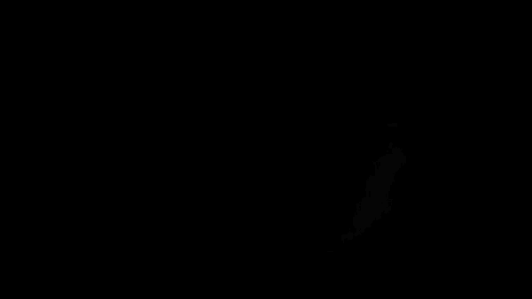 a glowing logo that says ' fc hamburg ' on it in a dark room
