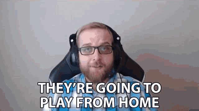 a man with glasses and headphones says they are going to play from home