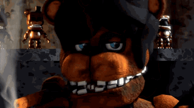 a close up of a teddy bear with a cigarette in his mouth