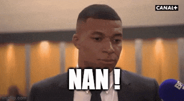 a man in a suit and tie is talking into a microphone and saying nan .