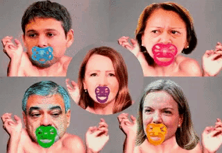 a group of people with pacifiers in their mouth