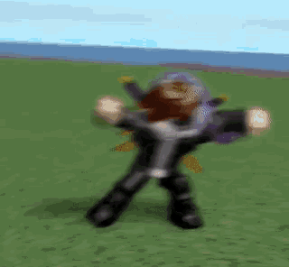 a blurry picture of a person dancing in a field