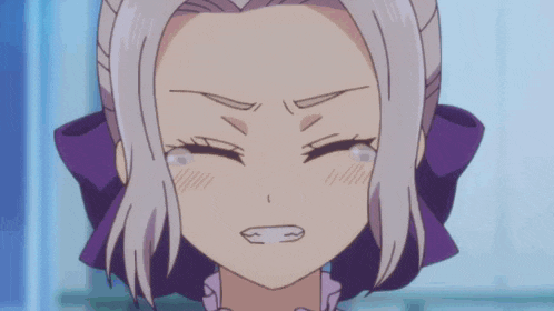 a close up of a girl with a purple bow on her head