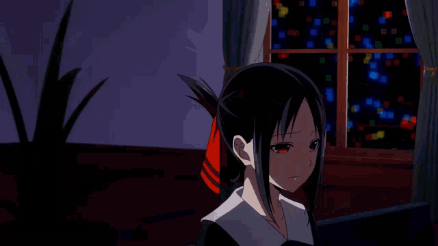 a girl with red eyes looks out a window at night