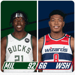 two basketball players one from the bucks and the other from the wizards are standing next to each other