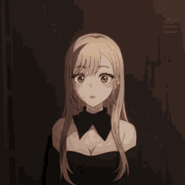 a girl in a black dress is crying with her eyes closed