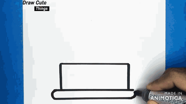 a person is drawing a top hat with a marker on a piece of paper that says draw cute things