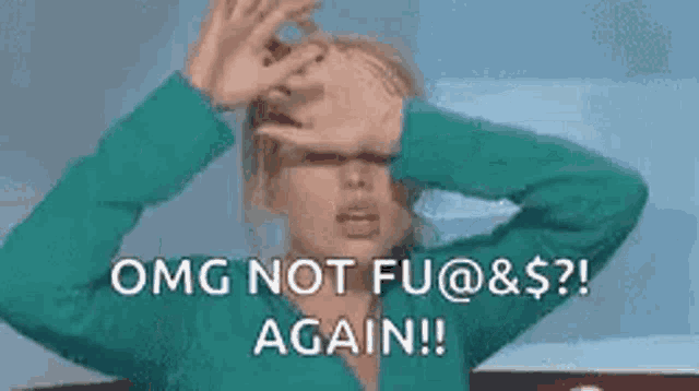 a woman in a green jacket is covering her eyes with her hands and screaming .