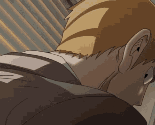 a close up of a man 's head with a shadow on it