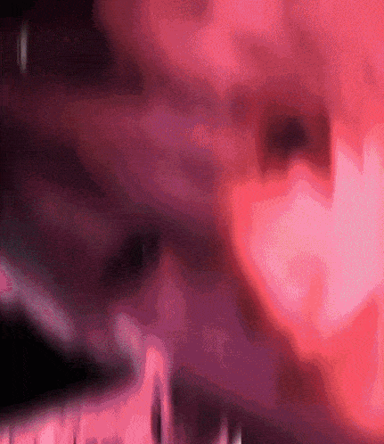 a close up of a pink and purple background with a blurred effect