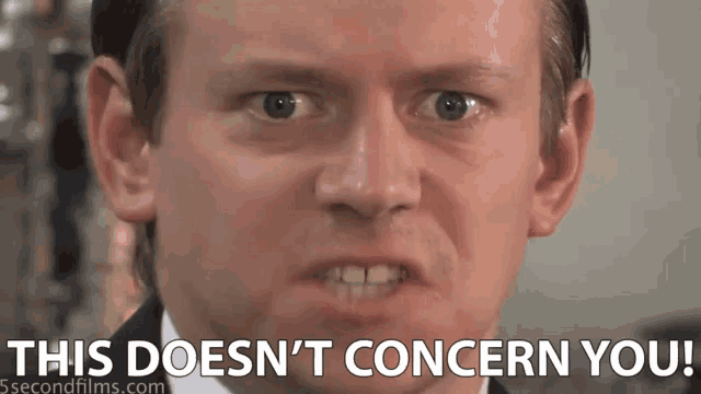 a close up of a man 's face with the words " this does n't concern you " below it