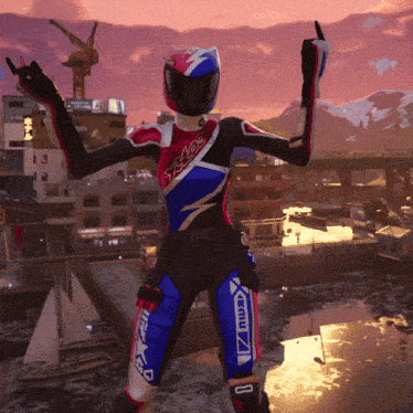 a person wearing a helmet and a suit that says kmu on the bottom
