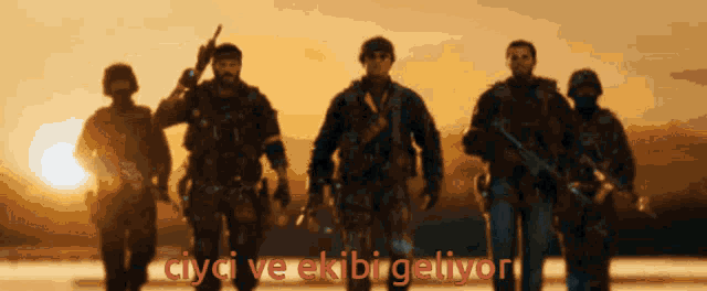 a group of soldiers are walking in a line with the words " ayci ve ekibi geliyor " written below them