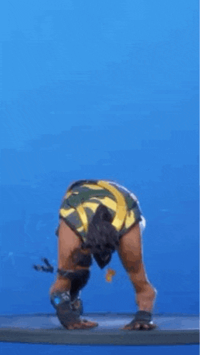 a man in a video game is kneeling down on a blue background .