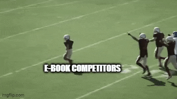 a group of football players are running on a field with the words `` e-book competitors '' written on the screen .
