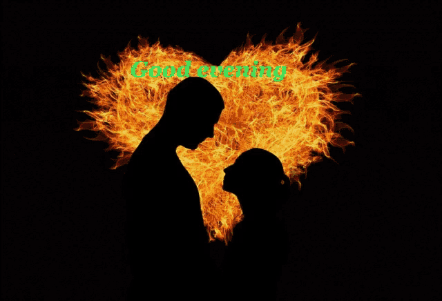 a silhouette of a man and woman in front of a heart of flames with the words good evening written on it
