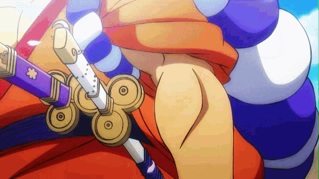 a close up of a person holding a sword with a flower on the handle