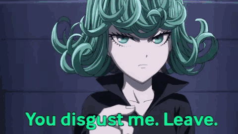 a girl with green hair is pointing at the camera with the words you disgust me leave
