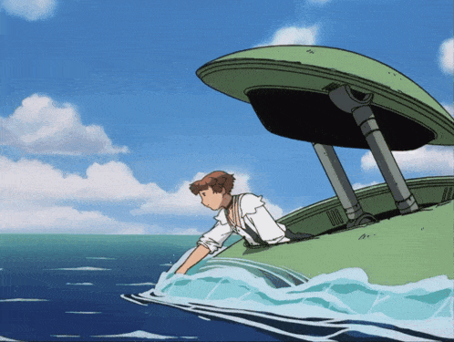 a man in a white shirt is getting out of a green boat in the ocean
