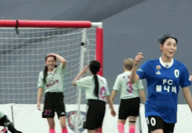 a soccer player wearing a blue jersey that says fc