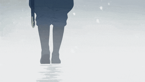 a person is walking in the snow with a sword