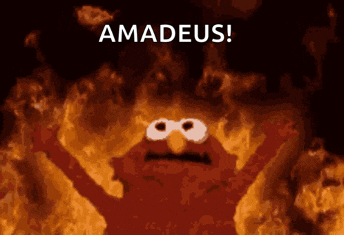 elmo is surrounded by flames and says amadeus